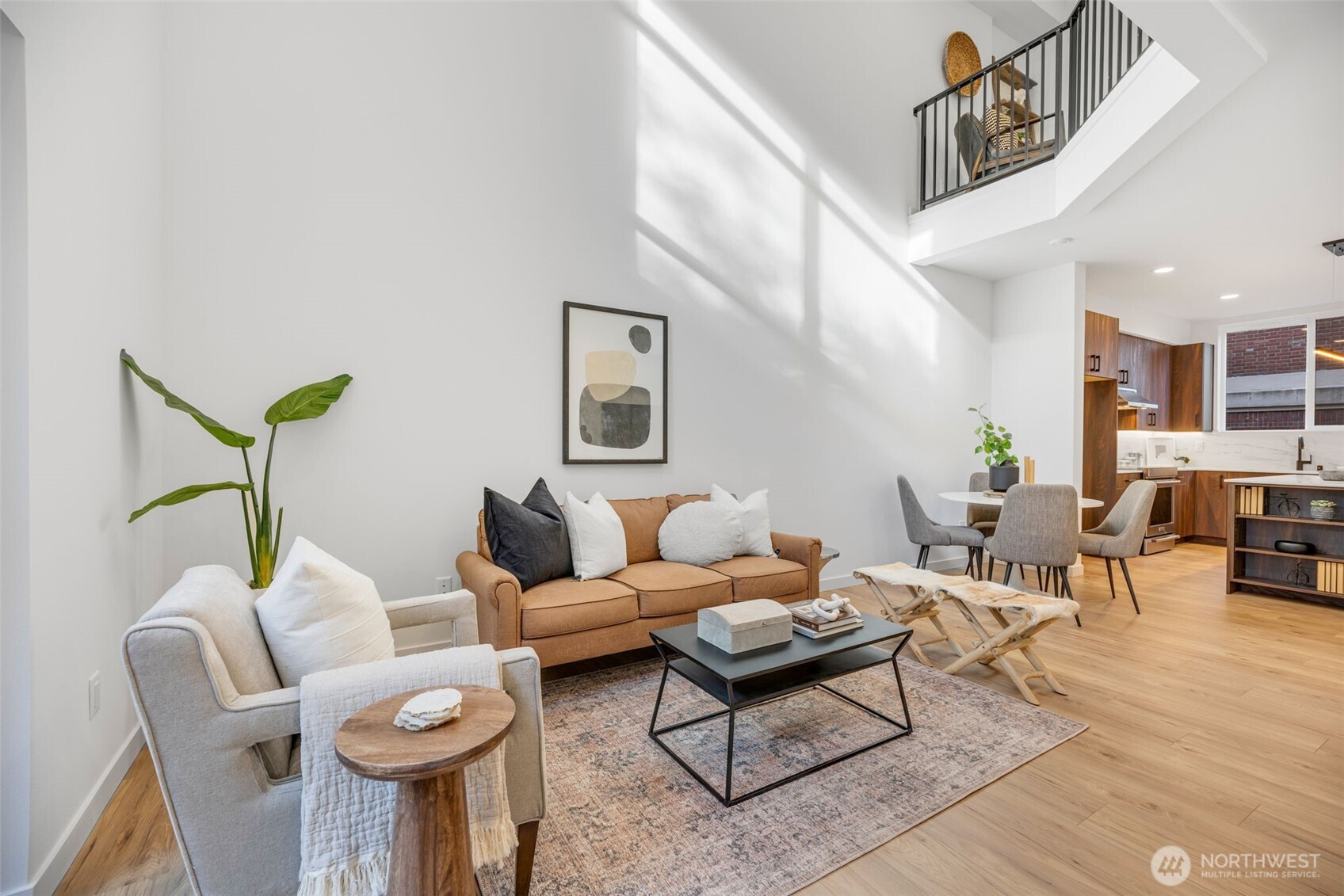 Sliders step out to balcony overlooking the lovely tree lined street.