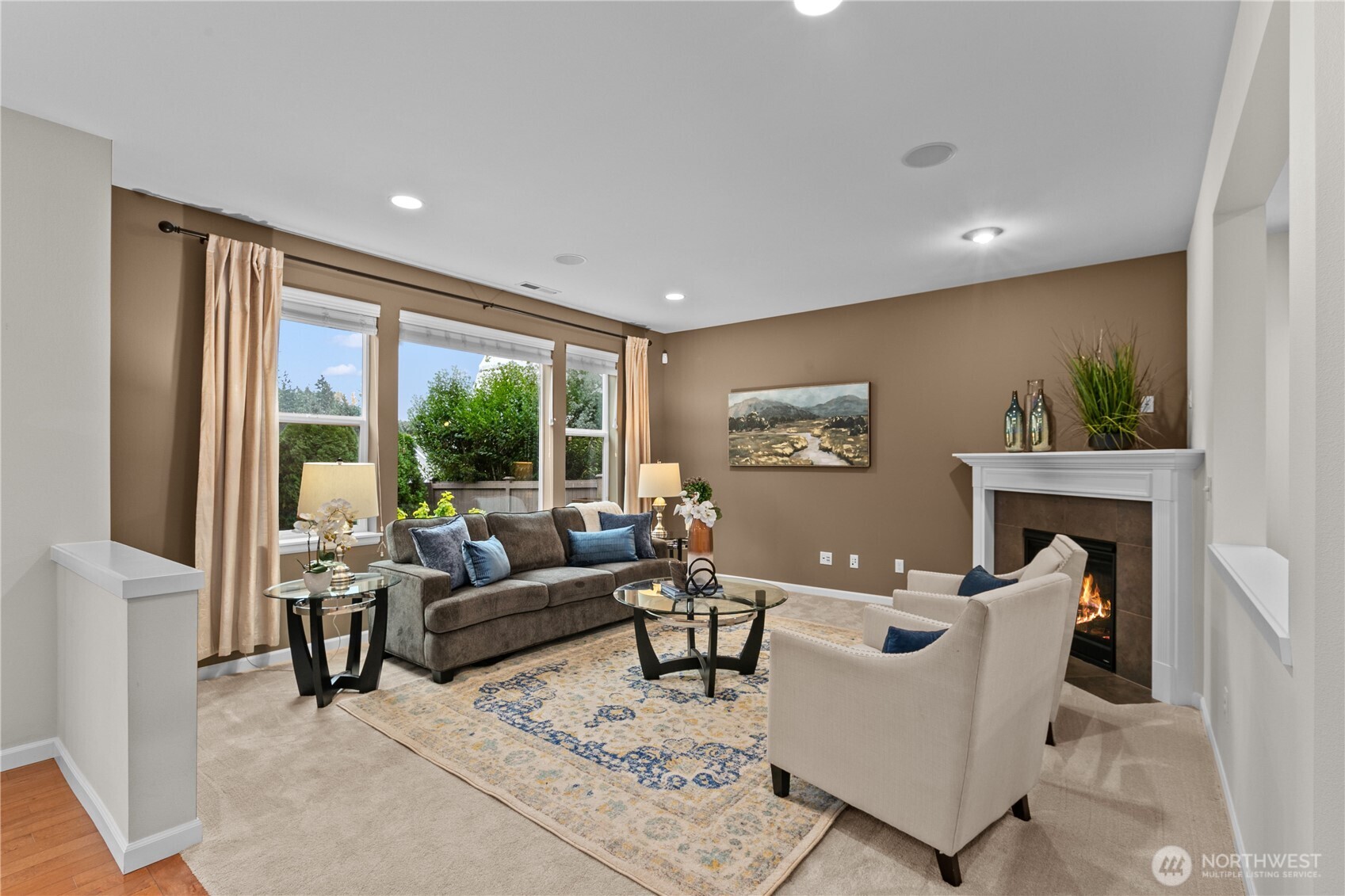 Open floor plan living room with fireplace