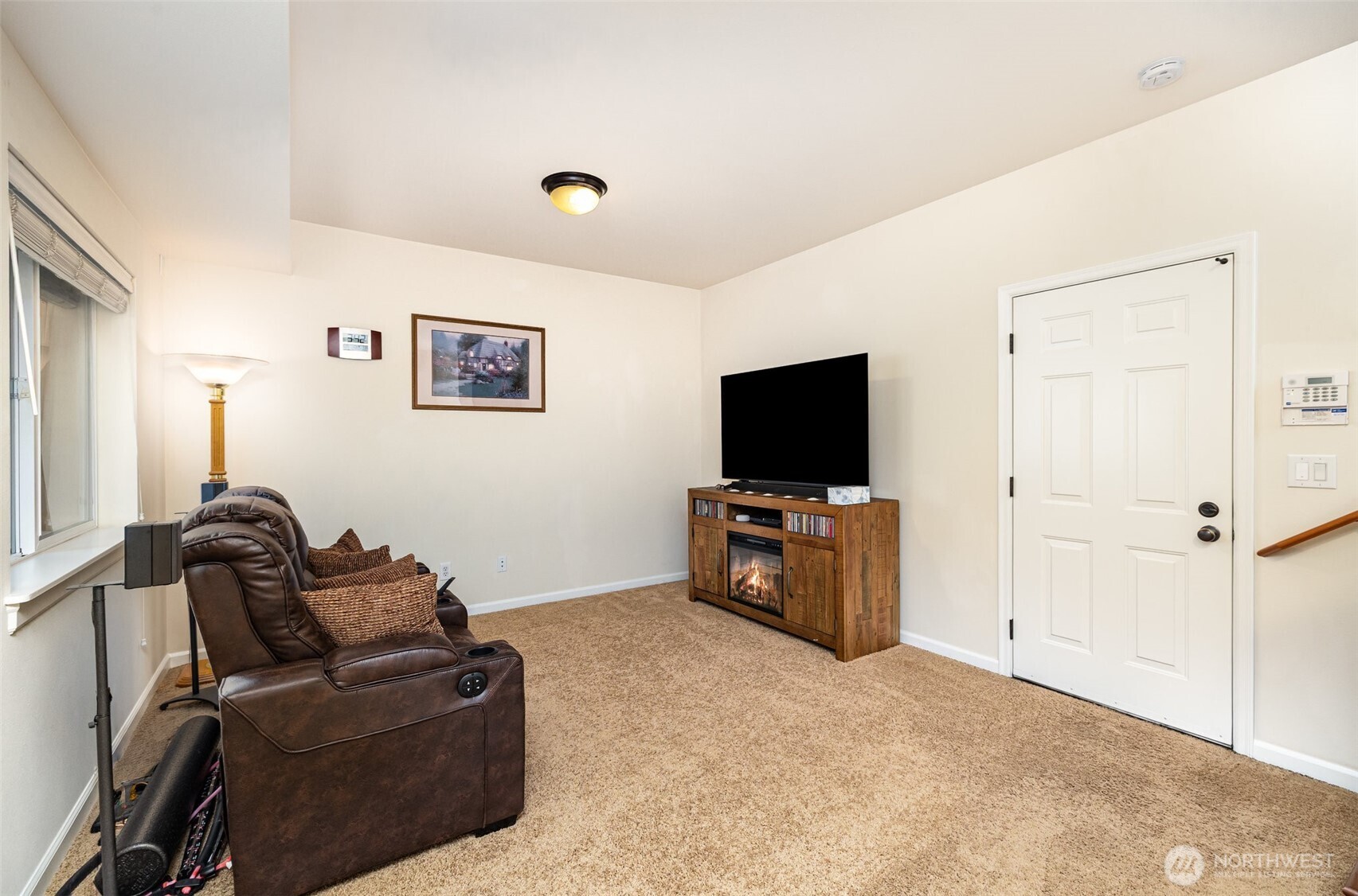 Another view of this versatile space, door leads to the garage.