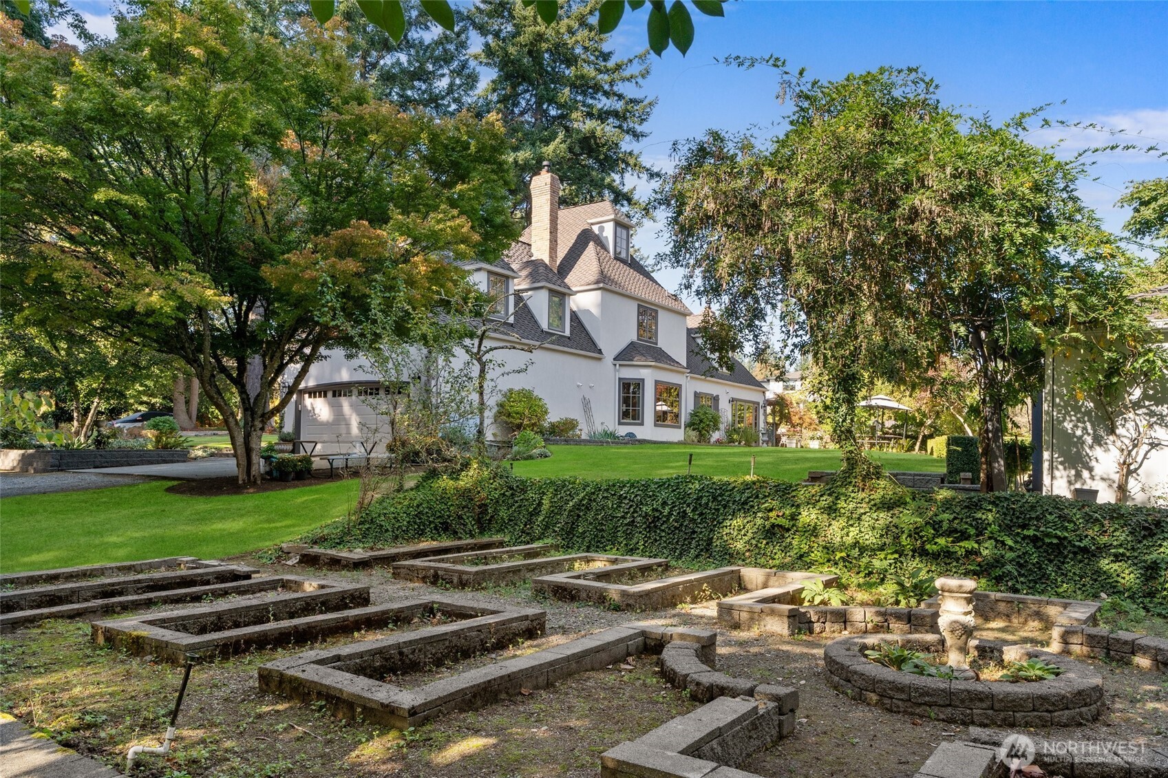 Spacious 2 car garage and large driveway holds much potential!