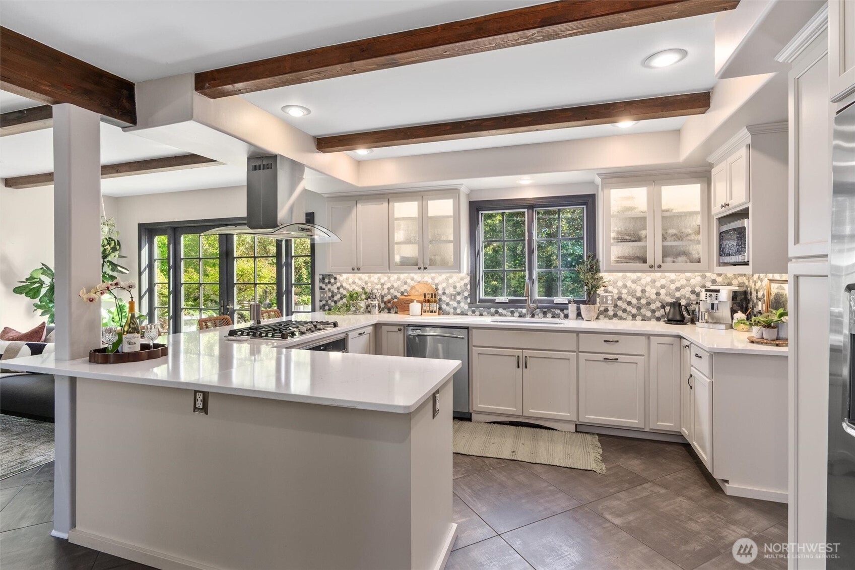 Enjoy cooking on gas stove and efficient overhead hood vent.