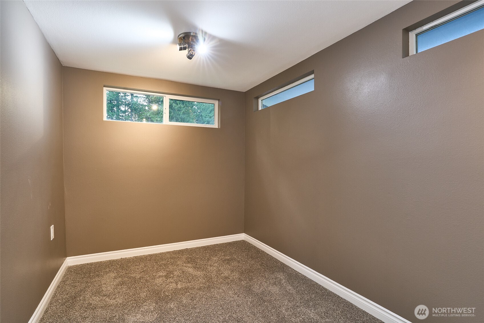 Fancy designer sink in Primary bathroom with granite countertops and mosaic backsplash.