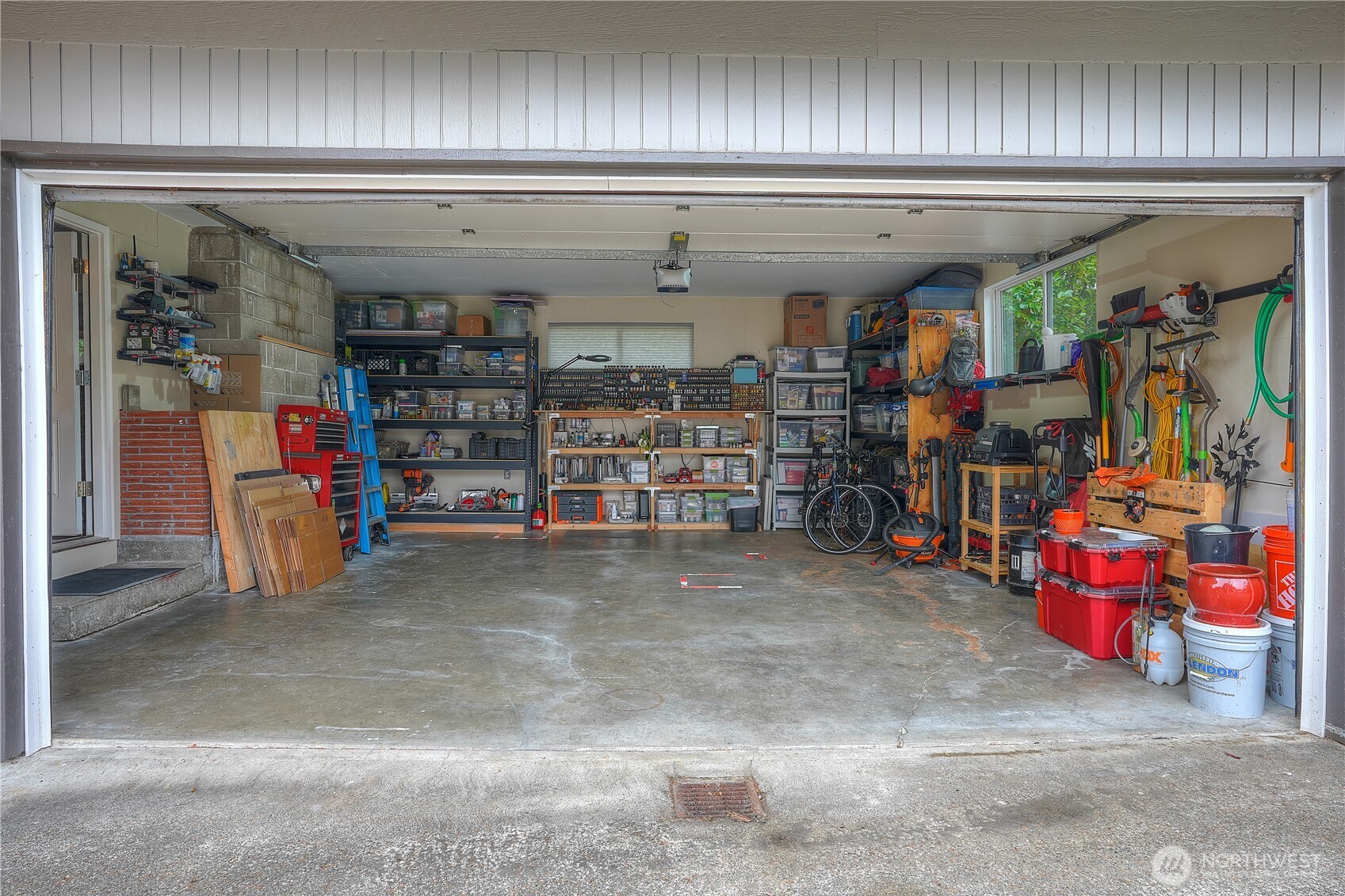 Spacious 2 car garage is approx. 484 sq.ft…amply off-street parking in front…