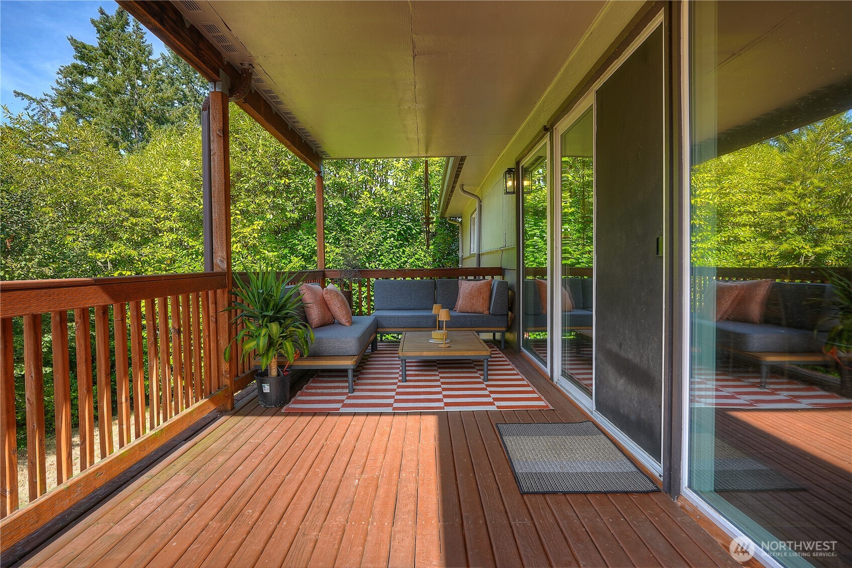 All season entertaining available on this covered patio…with stairs to the yard…