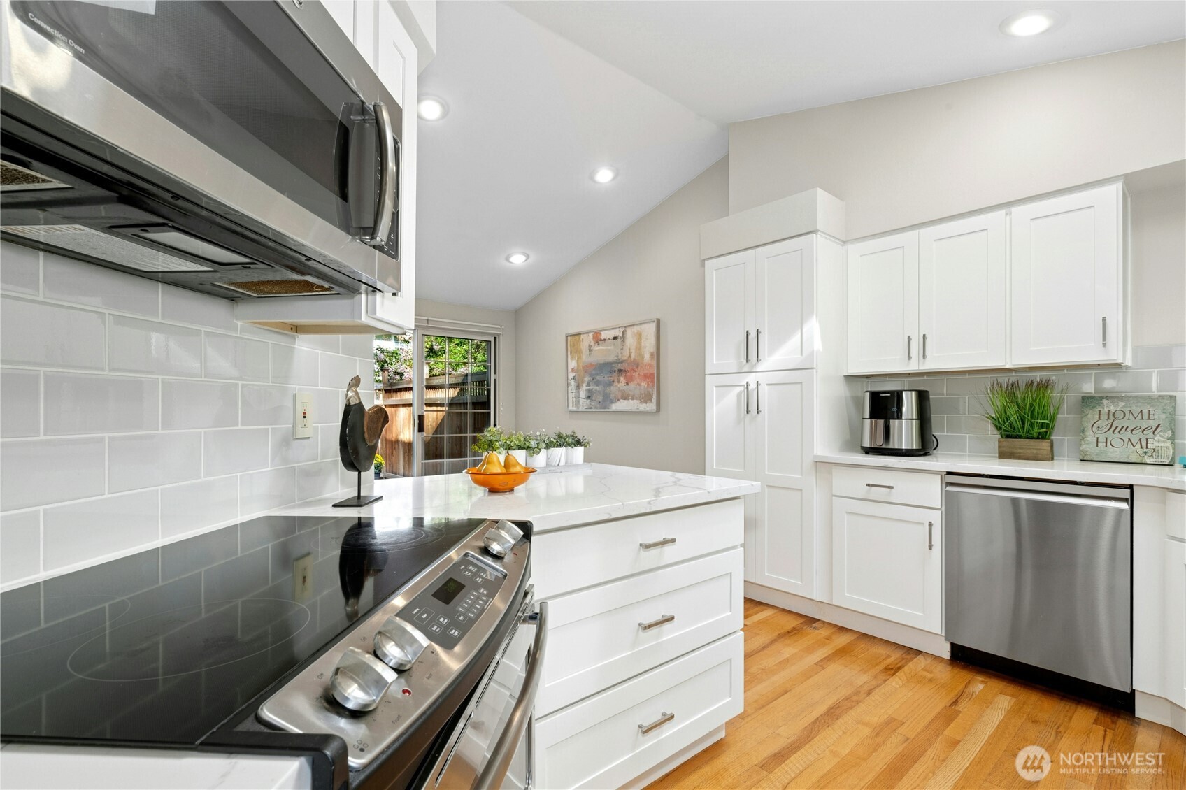 Quartz Counters and   Shaker Cabinets