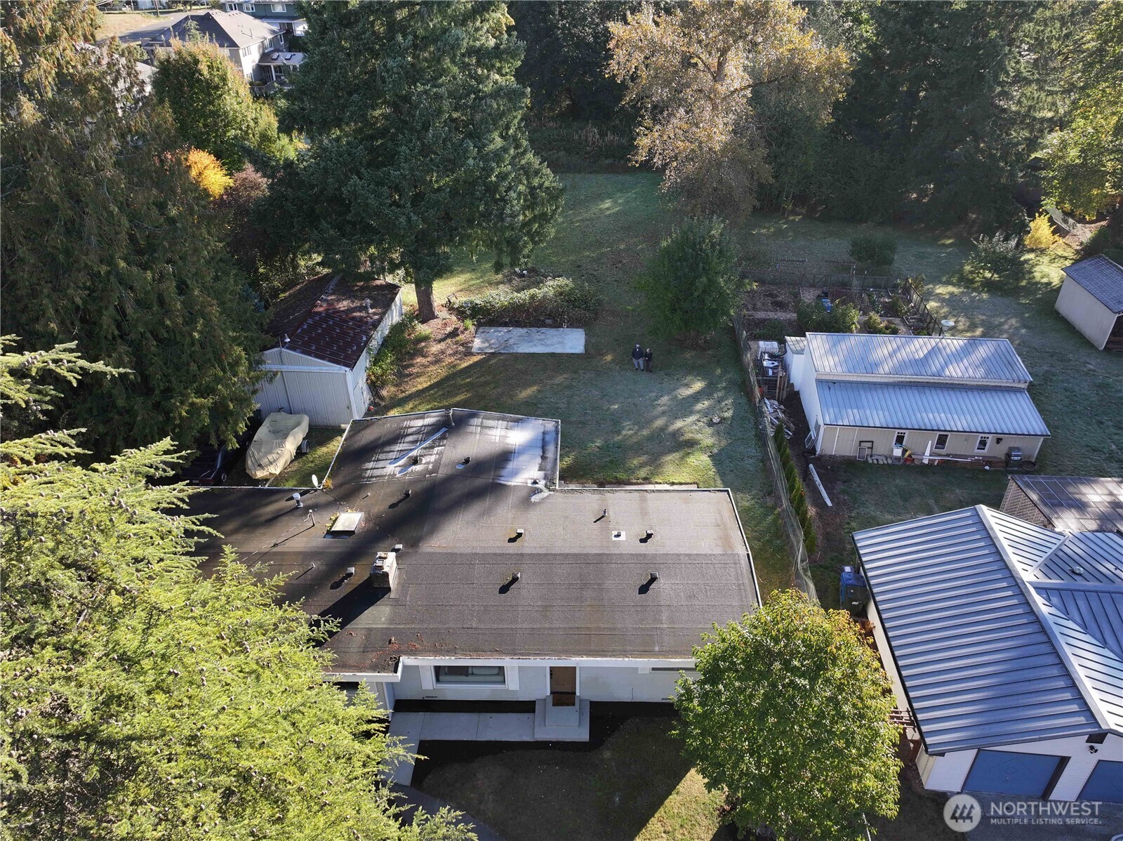 Front aerial perspective showing entire lot