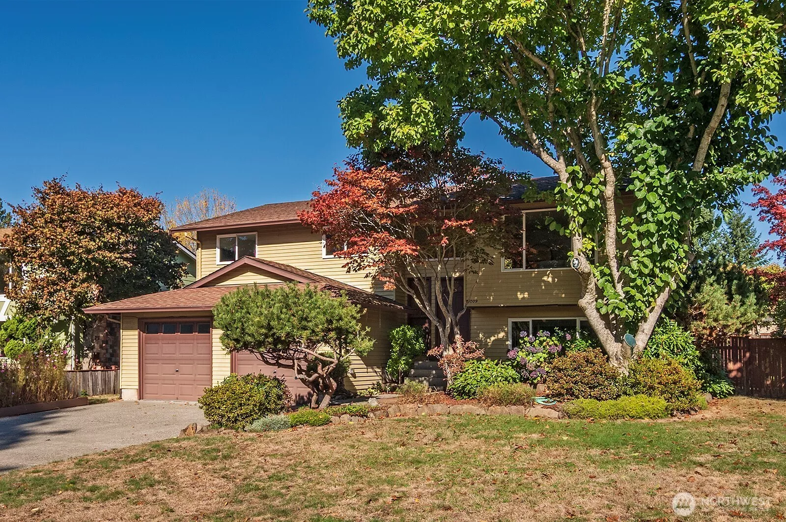 Welcome Home! Nicely sited on a large lot, with a fenced back yard- this house is move in ready!