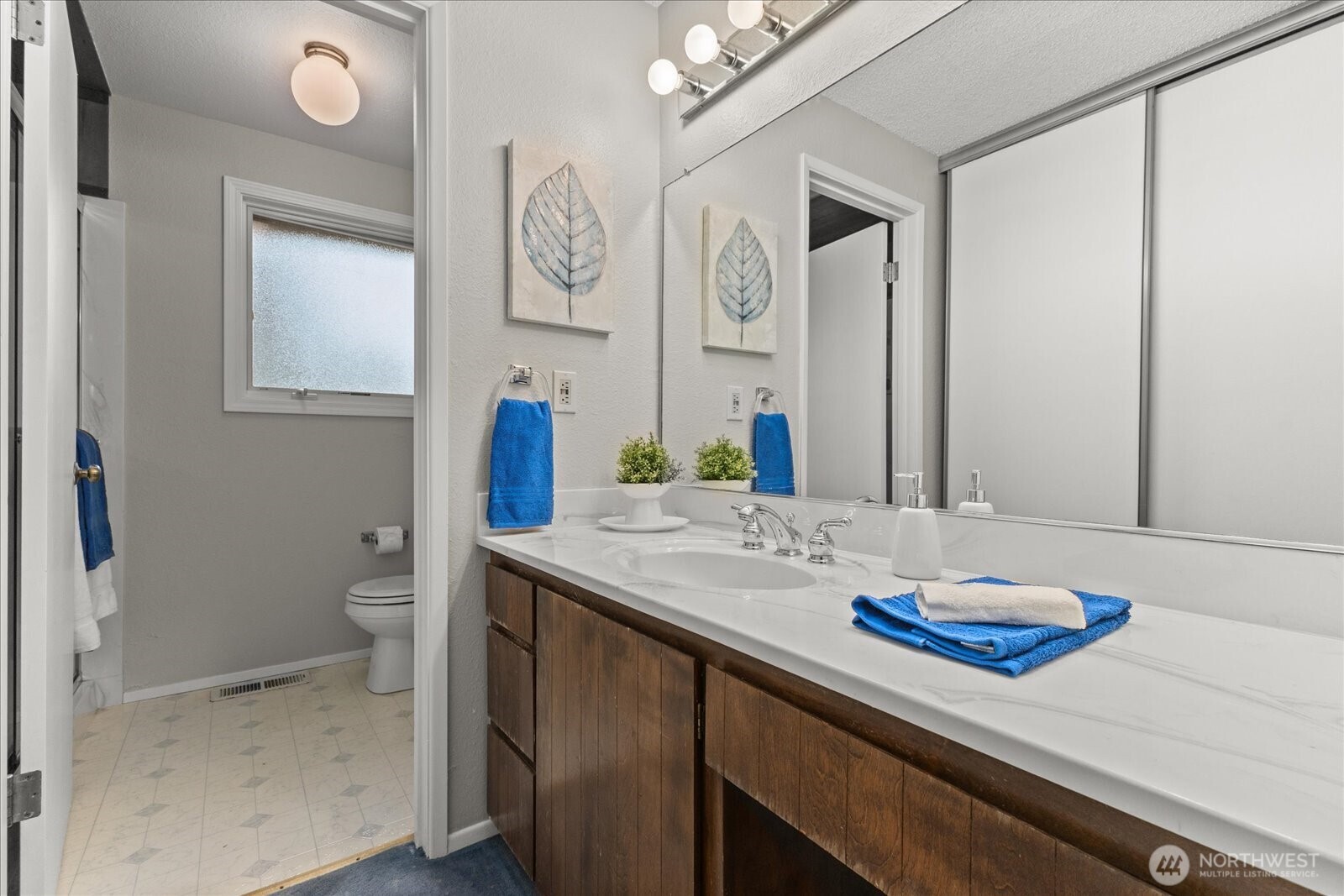 Primary private 3/4 bath with dual sinks