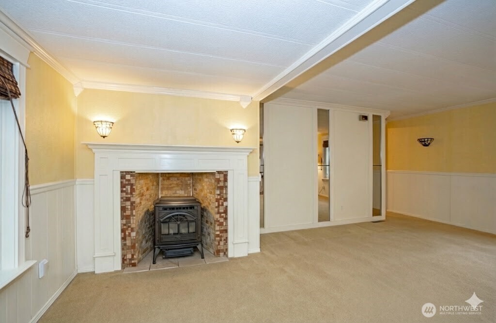 Living area with a pellet stove seamlessly integrated into the fireplace.