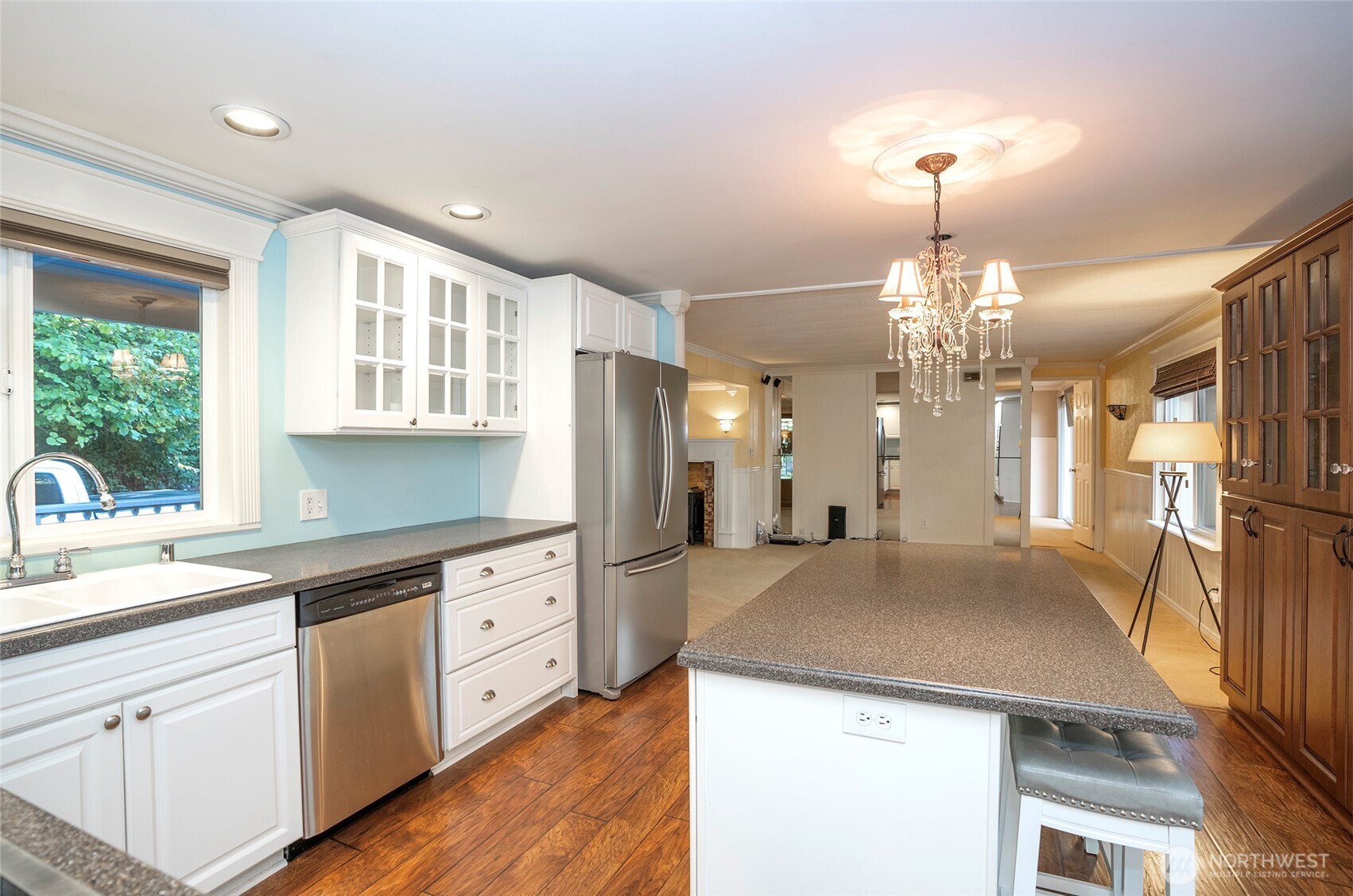 Cook in style! The remodeled kitchen with beautiful cabinets is sure to inspire your inner chef. Virtually staged to inspire your vision of the space.