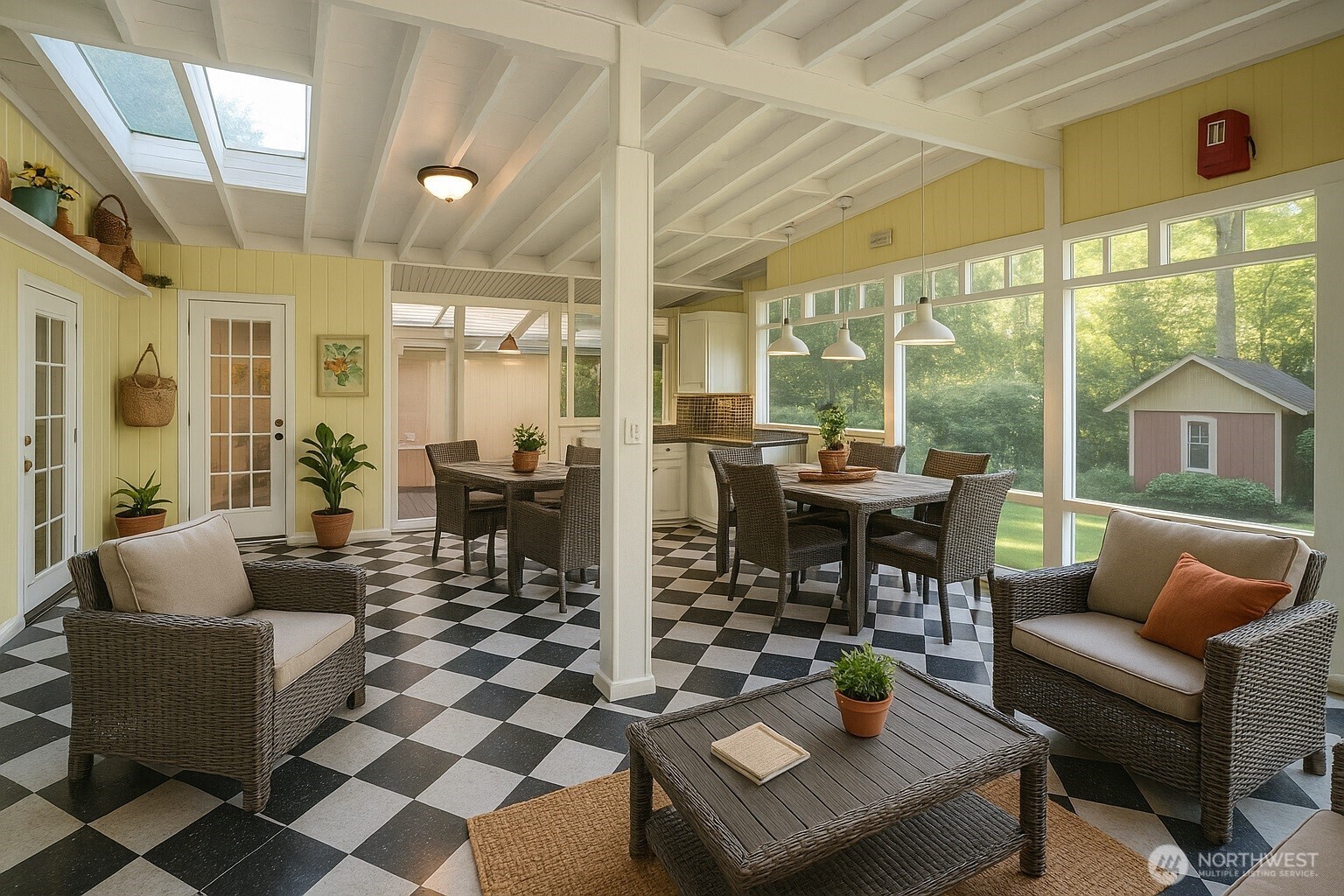 Enjoy another perspective of the kitchen, highlighting the stunning cabinetry that continues down the hall.