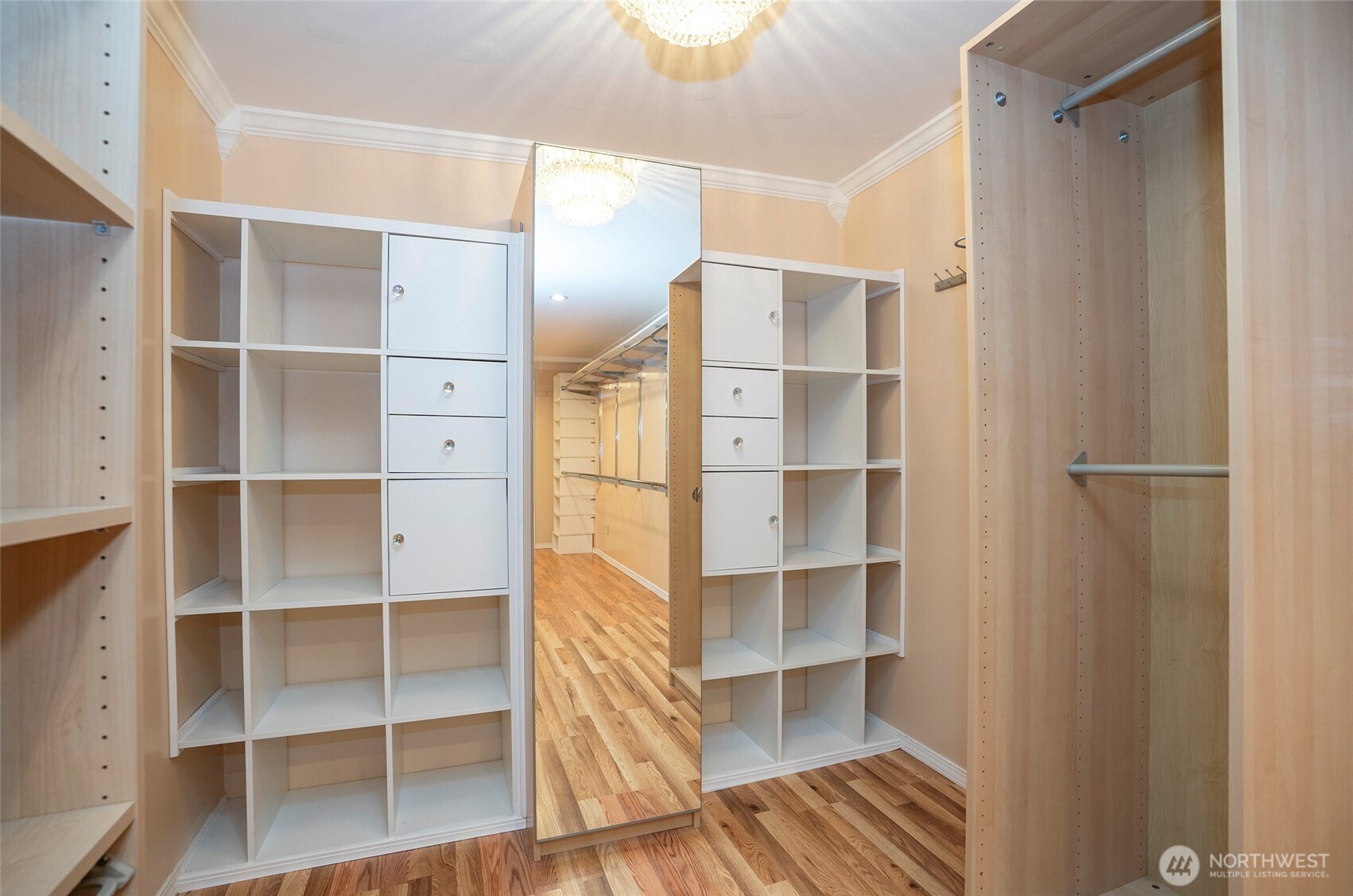 Expansive walk-in closet with extra cabinetry at each end—perfect for organizing all your belongings!