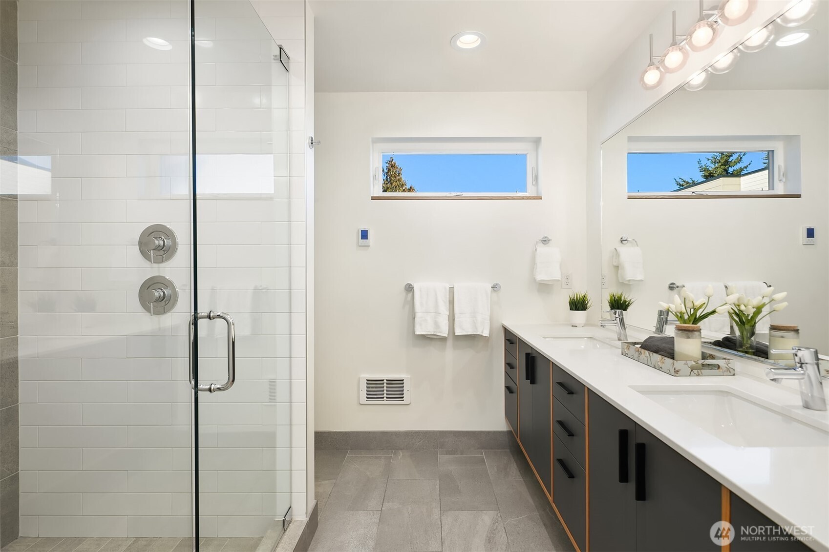 Primary bath. Shower features 2 shower heads!