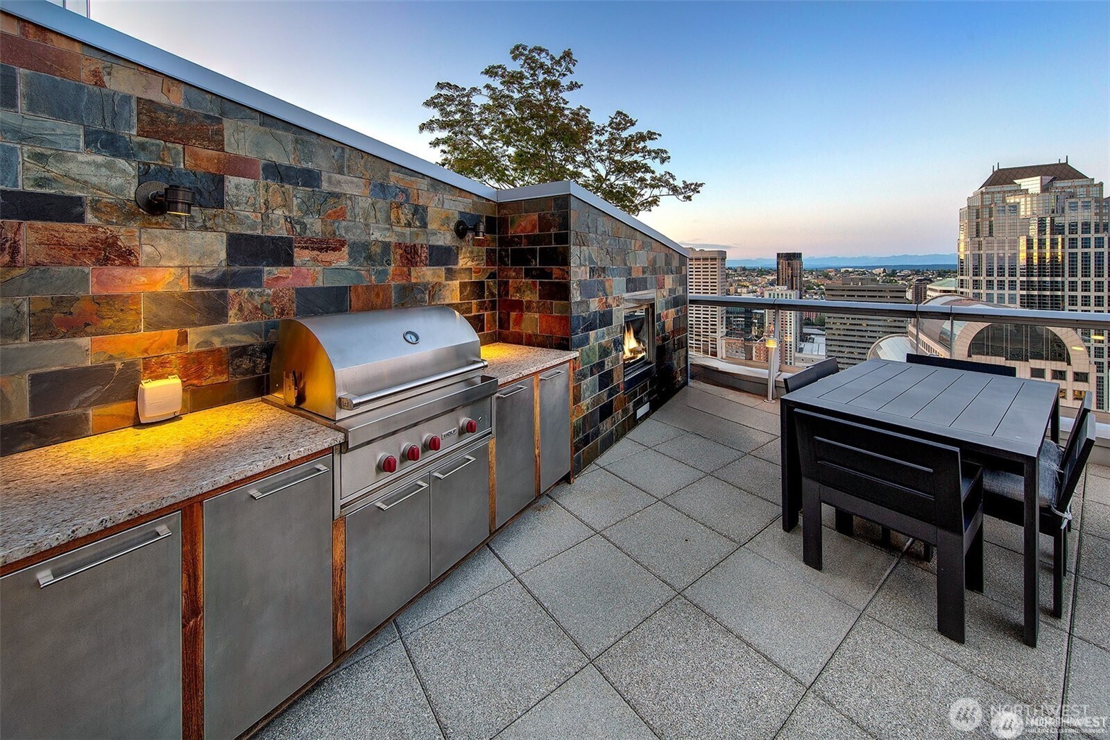 private roof deck comes with full indoor kitchenette outdoor built in grill fireplace tv speakers light!