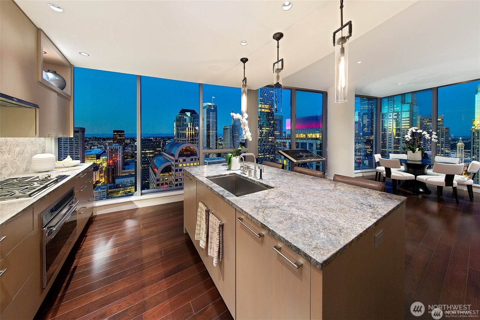 designer kitchen, gas cooking, custom light fixtures, tons of storage