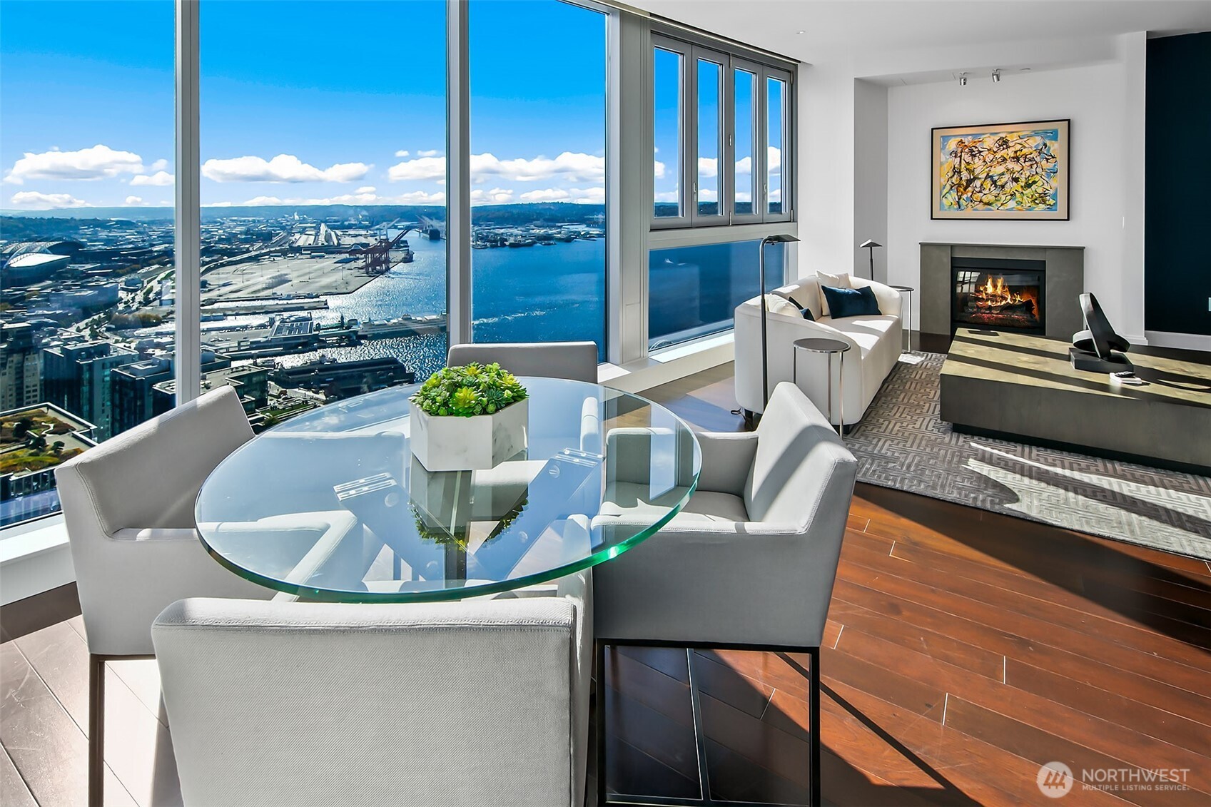 open floor plan near floor to ceiling windows corner home