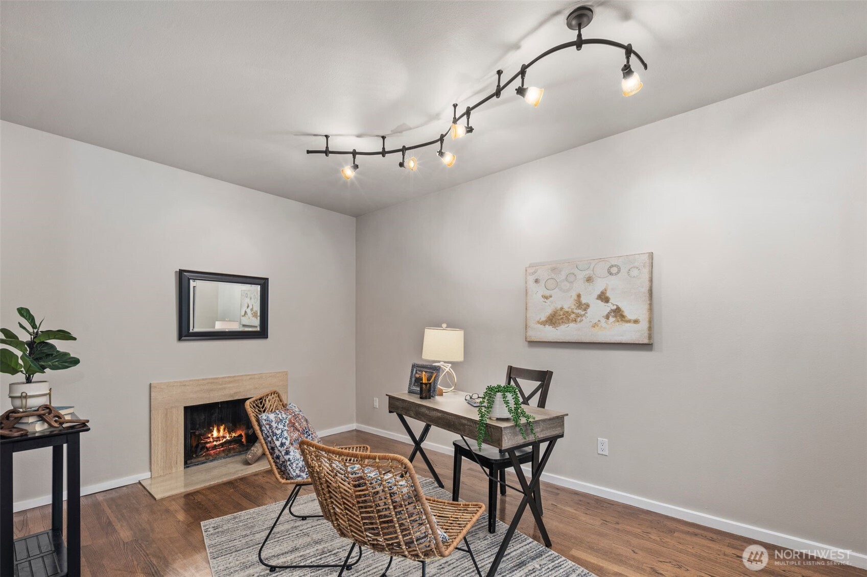 Warm and inviting office with authentic wood burning fireplace.