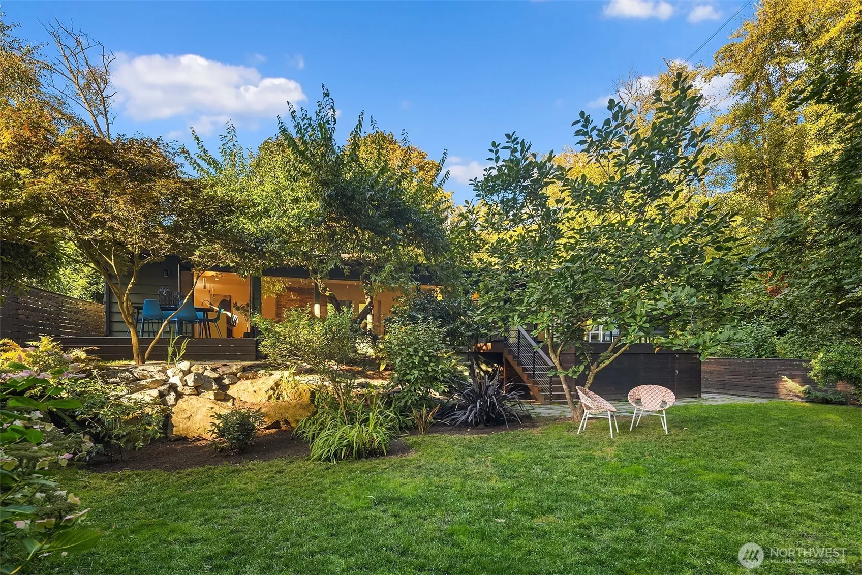 Enjoy peaceful serenity in this private and sprawling backyard