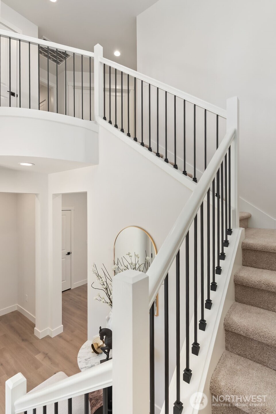 Interior photo shown is from a similar new construction home by the same builder. Fixtures, flooring, floor plan, and finishes are representative and may differ from the home currently under construction.