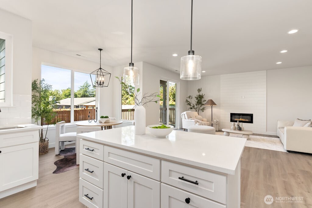 Interior photo shown is from a similar new construction home by the same builder. Fixtures, flooring, floor plan, and finishes are representative and may differ from the home currently under construction.