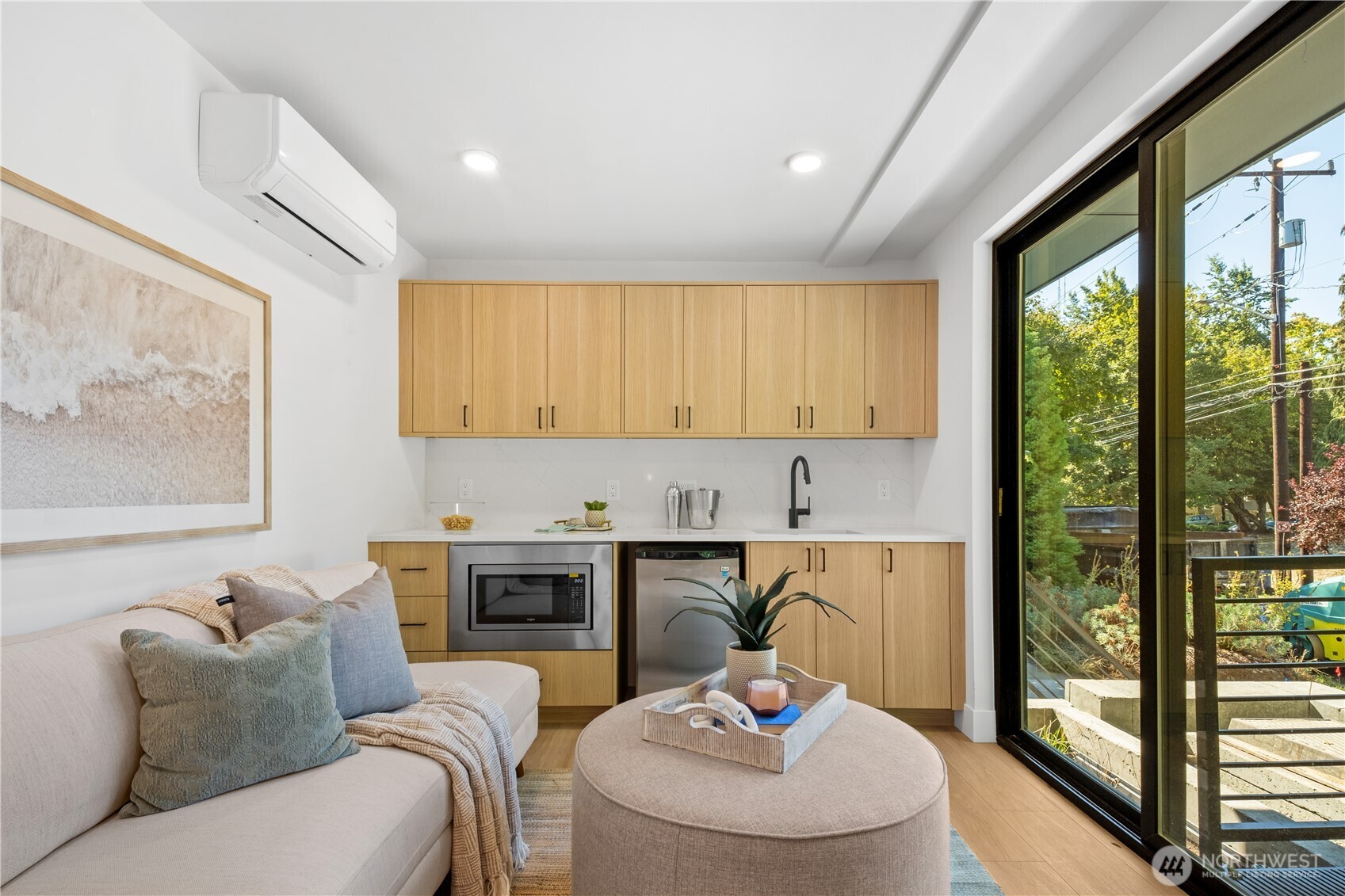 Kitchenette w/Fridge, microwave sink & stove hook ups.