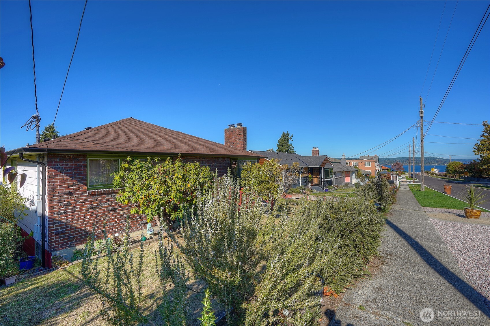 Look at that gorgeous new roof (and the Puget Sound in the distance not too shabby either.)