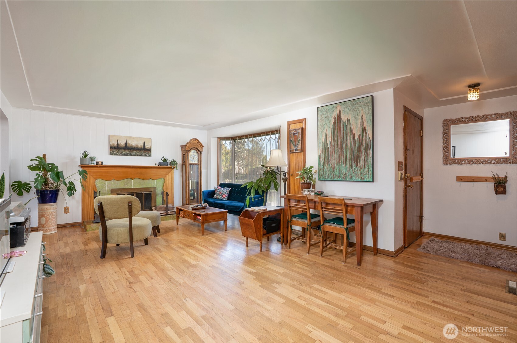 Gleaming hardwood floors greet you as you enter your new home.