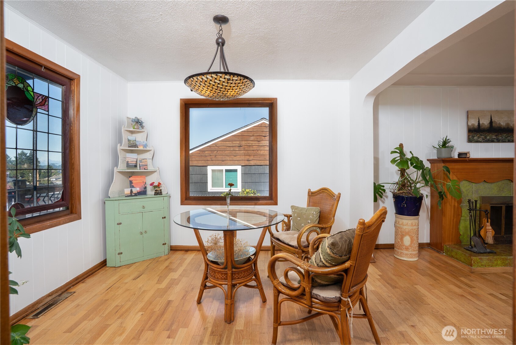 The dining area is adjacent to the living room and the kitchen and has great territorial views.