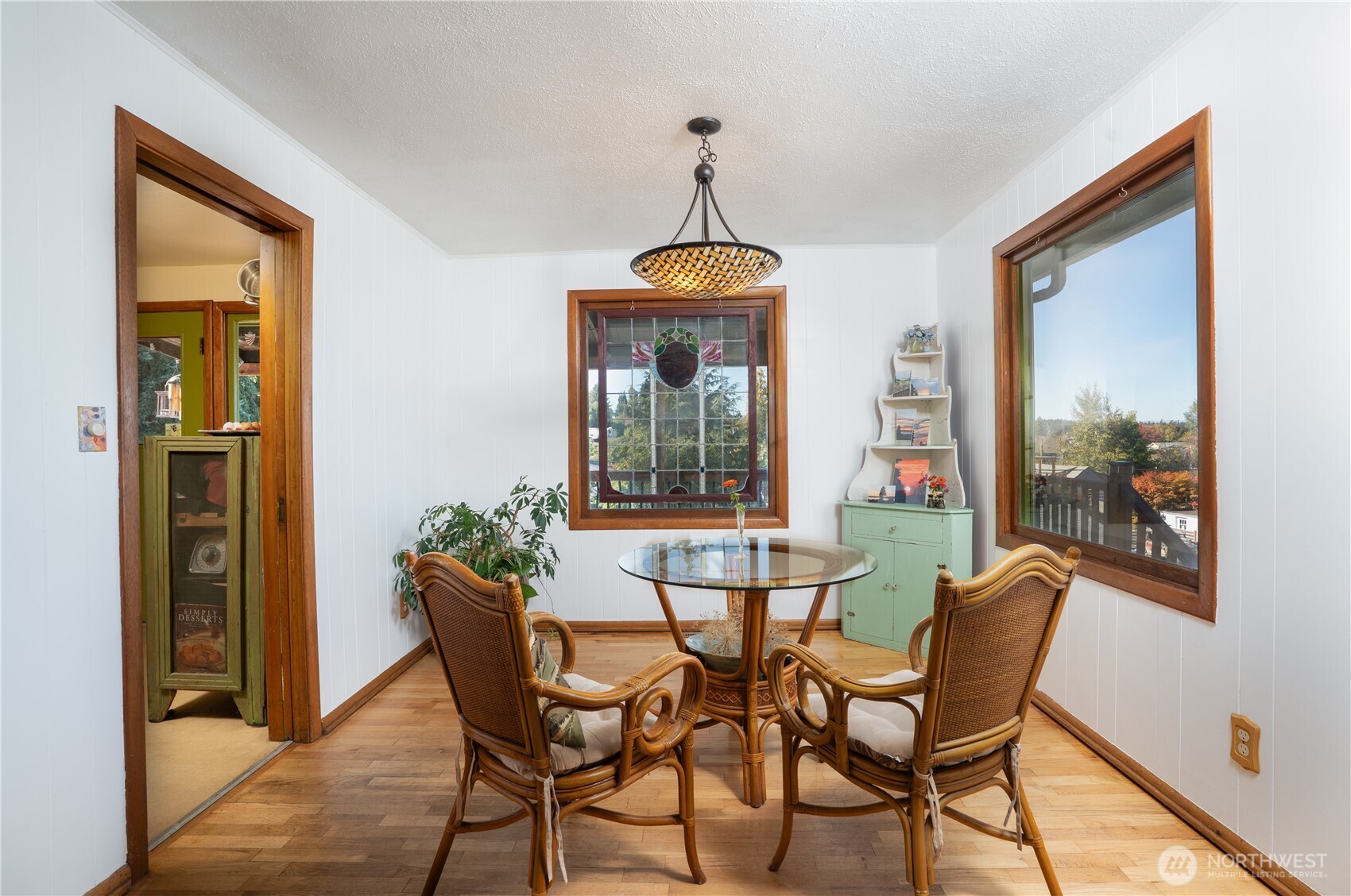 The kitchen, to the left, has pocket doors- how do you entertain? Making magic with your team of elves sequestered in the kitchen? Close the doors. Love to be in the midst of it all? Keep the door open and let the energy flow.