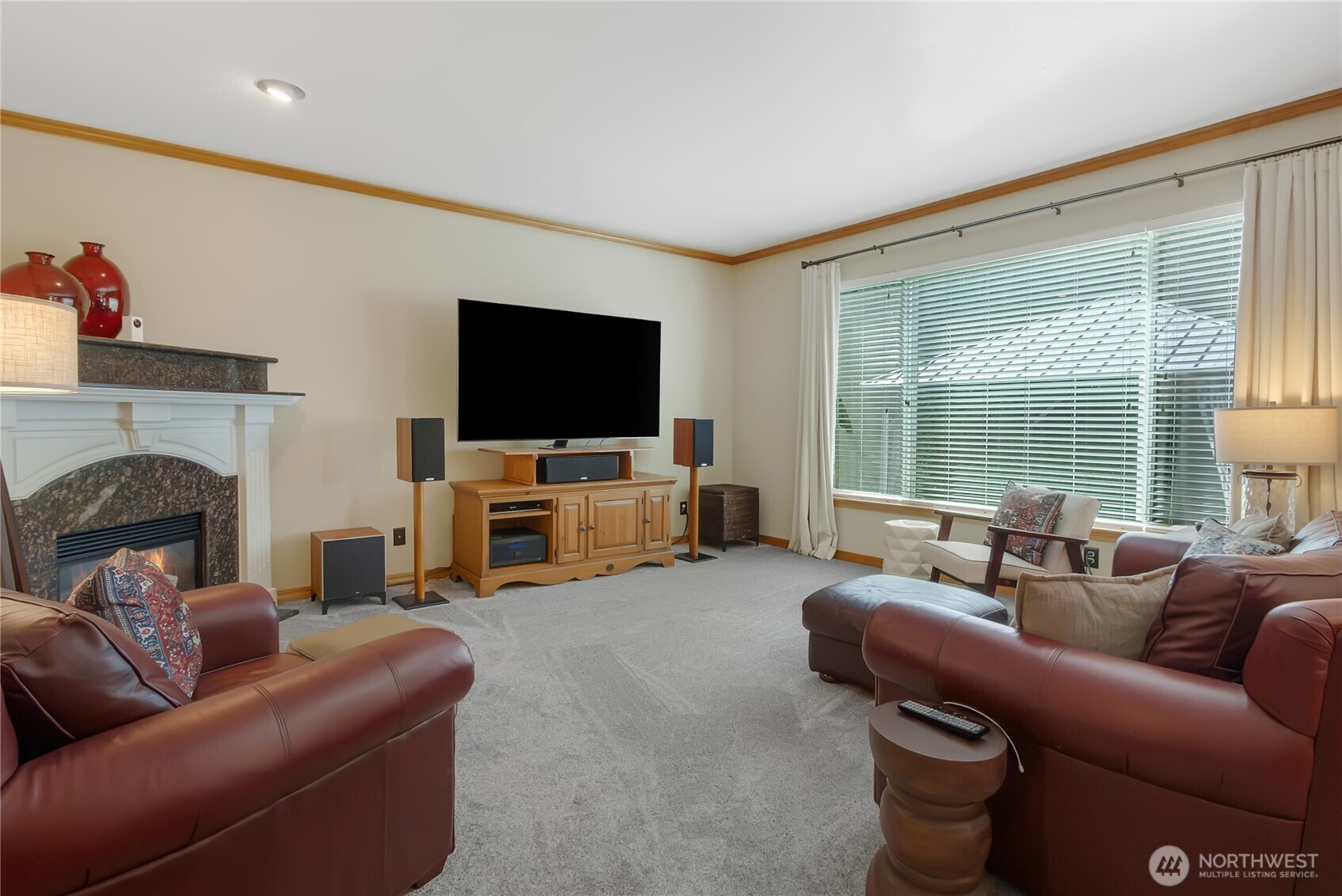 Large family room with gas fireplace.