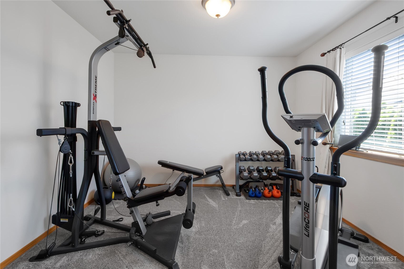 Sitting area off of Primary bedroom. Perfect for home gym or just relaxing.