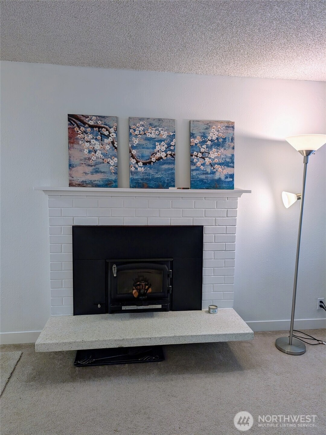 Wood burning fireplace stove on the main level, very efficient