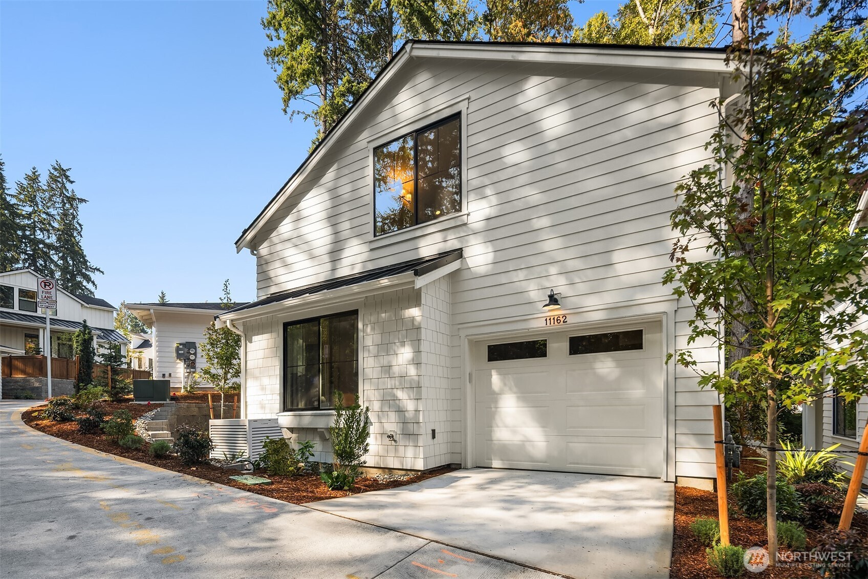 Neighboring cottage showing garage location.  Similar location to subject property, for demonstration purposes only.