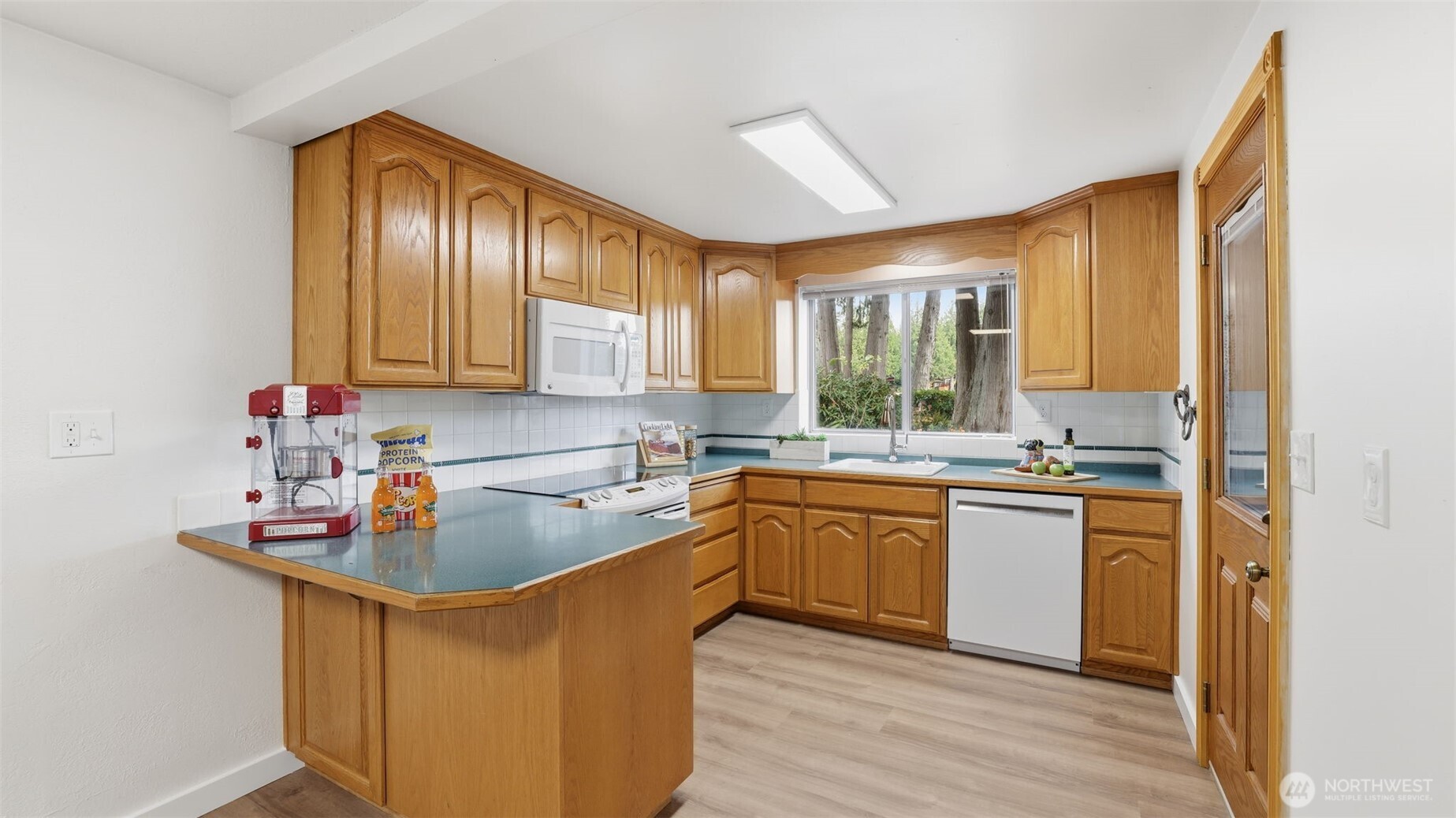 The ideal multipurpose lower level—movie nights, game time, or guest stays welcome.