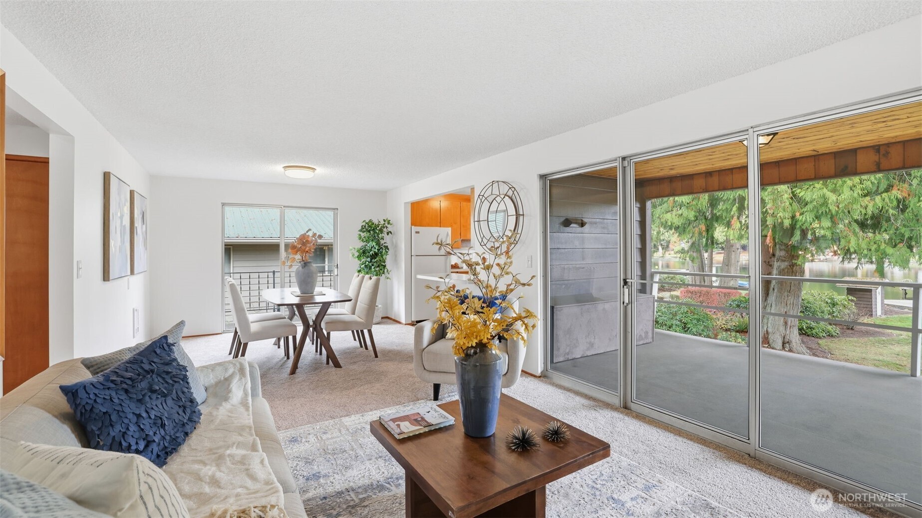 Expansive dock perfect for gatherings, sunbathing, and lakeside entertaining