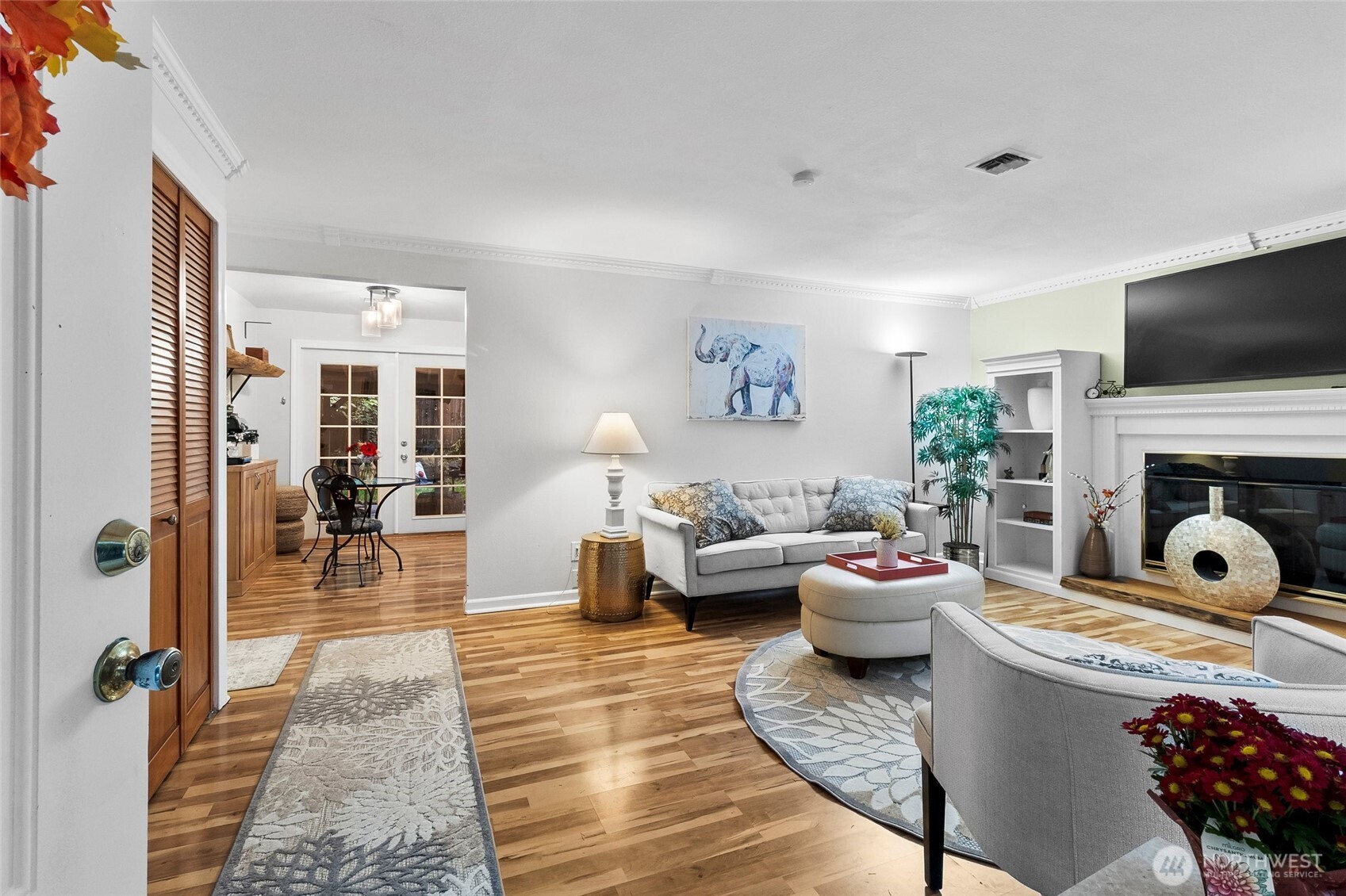 Formal living room with gas fireplace.