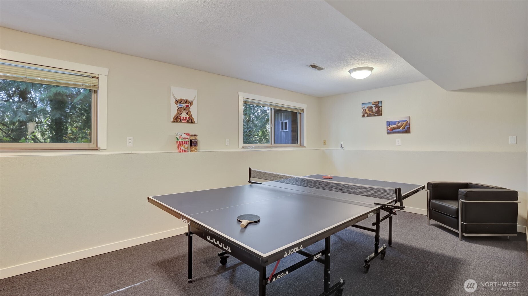 This spacious, lengthy room offers endless possibilities for relaxation, recreation, or creativity.