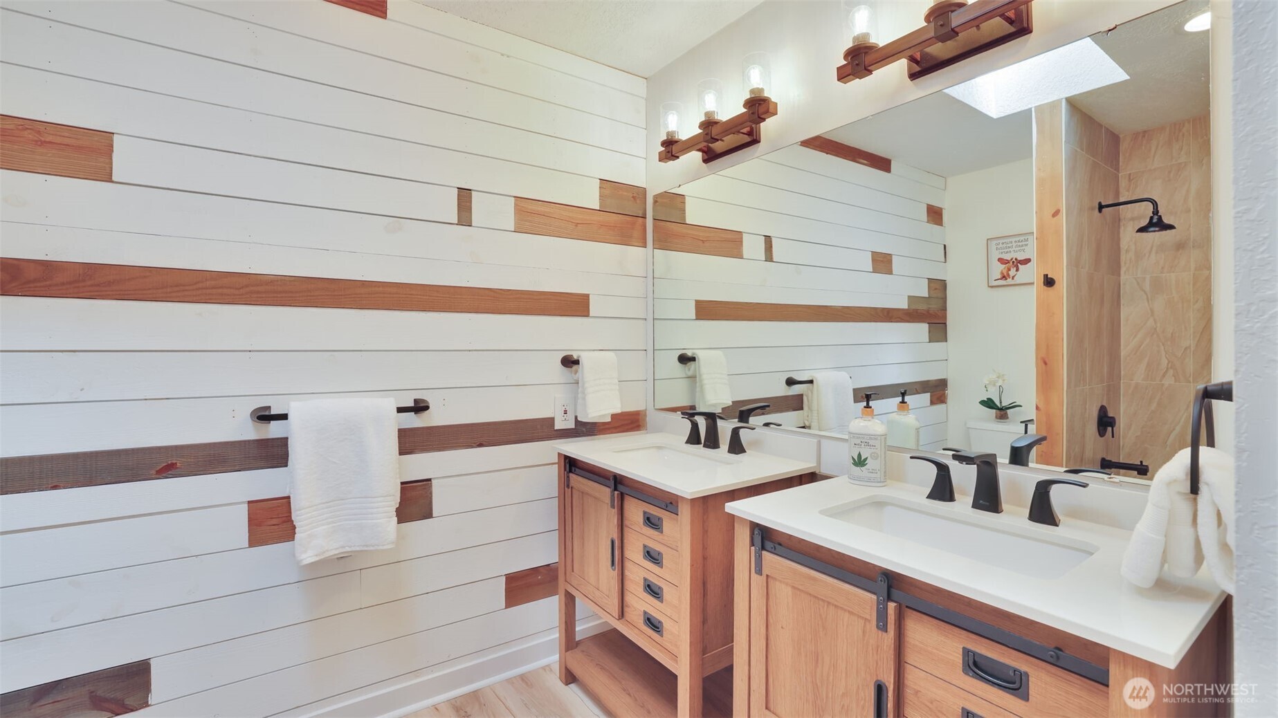 Convenient double vanity guest bathroom upstairs.