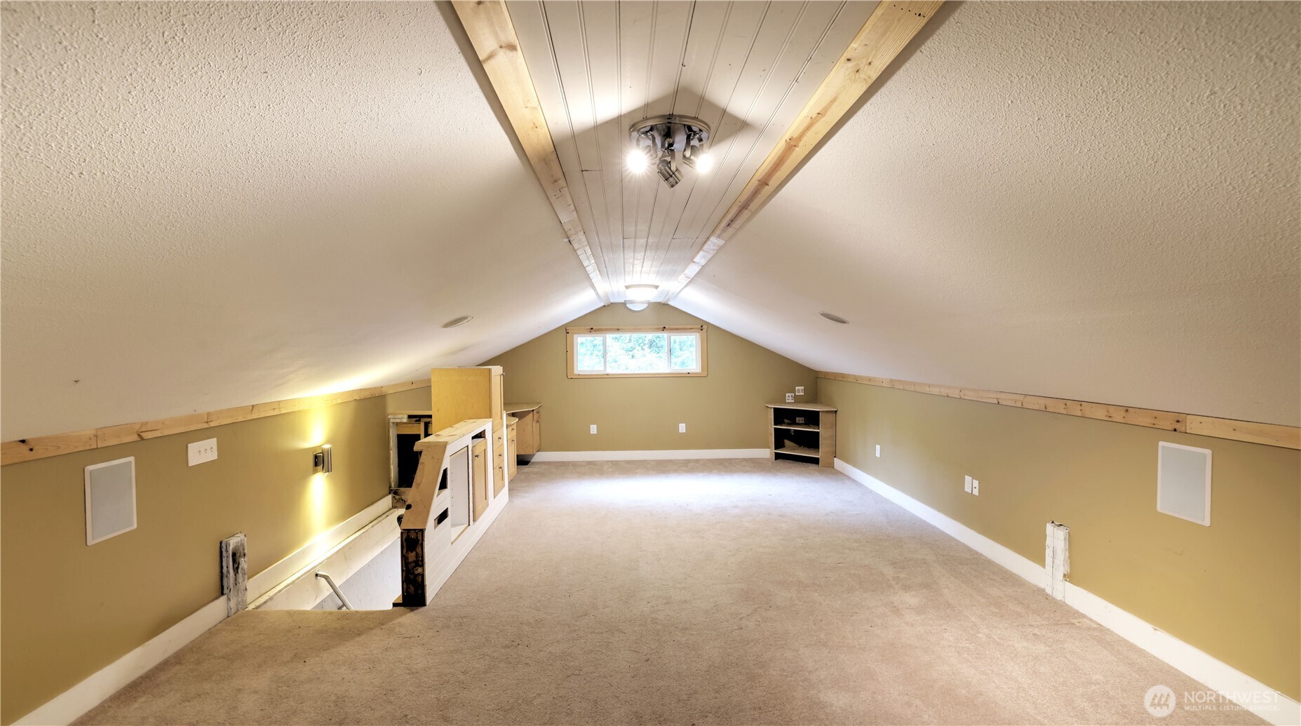 This huge studio space sits above the garage and is a great flex/bonus space from the home to create your own space.