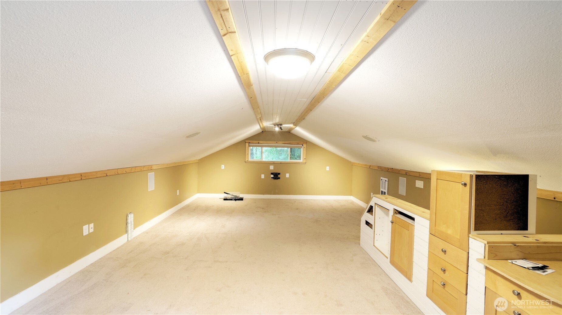 Spacious left/studio above the garage is great for extra storage, art studio, or whatever your lifestyle needs!