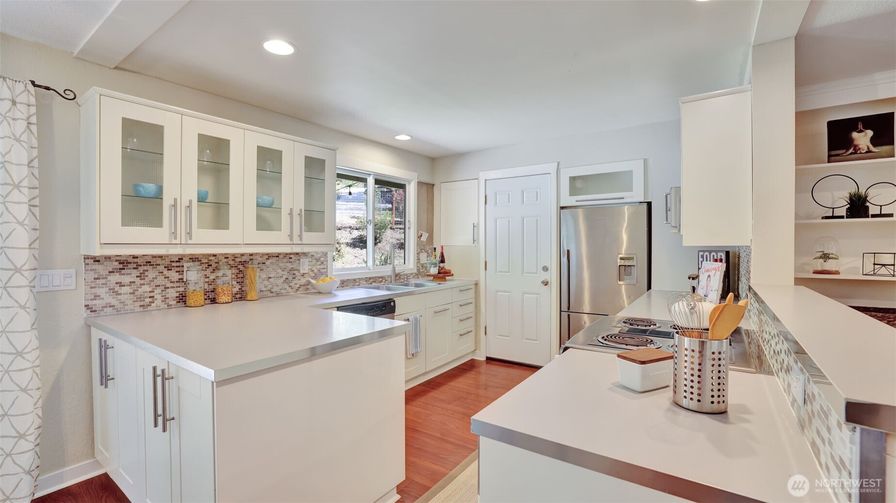 Additional cabinetry offers plenty of storage for everyday essentials.