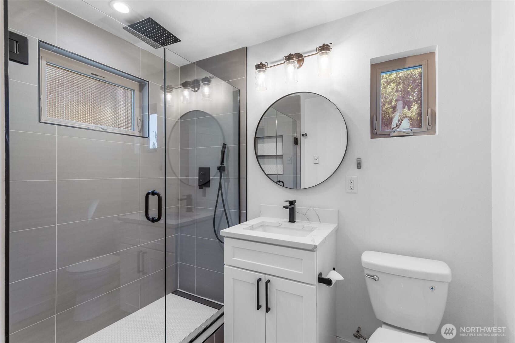 Modern fixtures and timeless tilework—spa-like luxury at home.