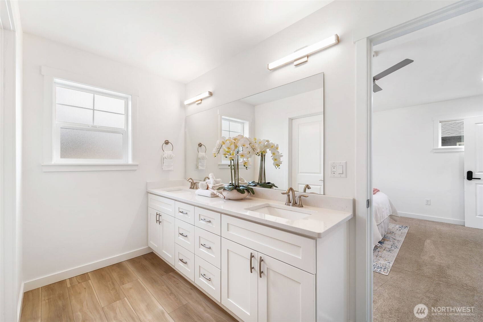 Dual sinks in primary bathroom