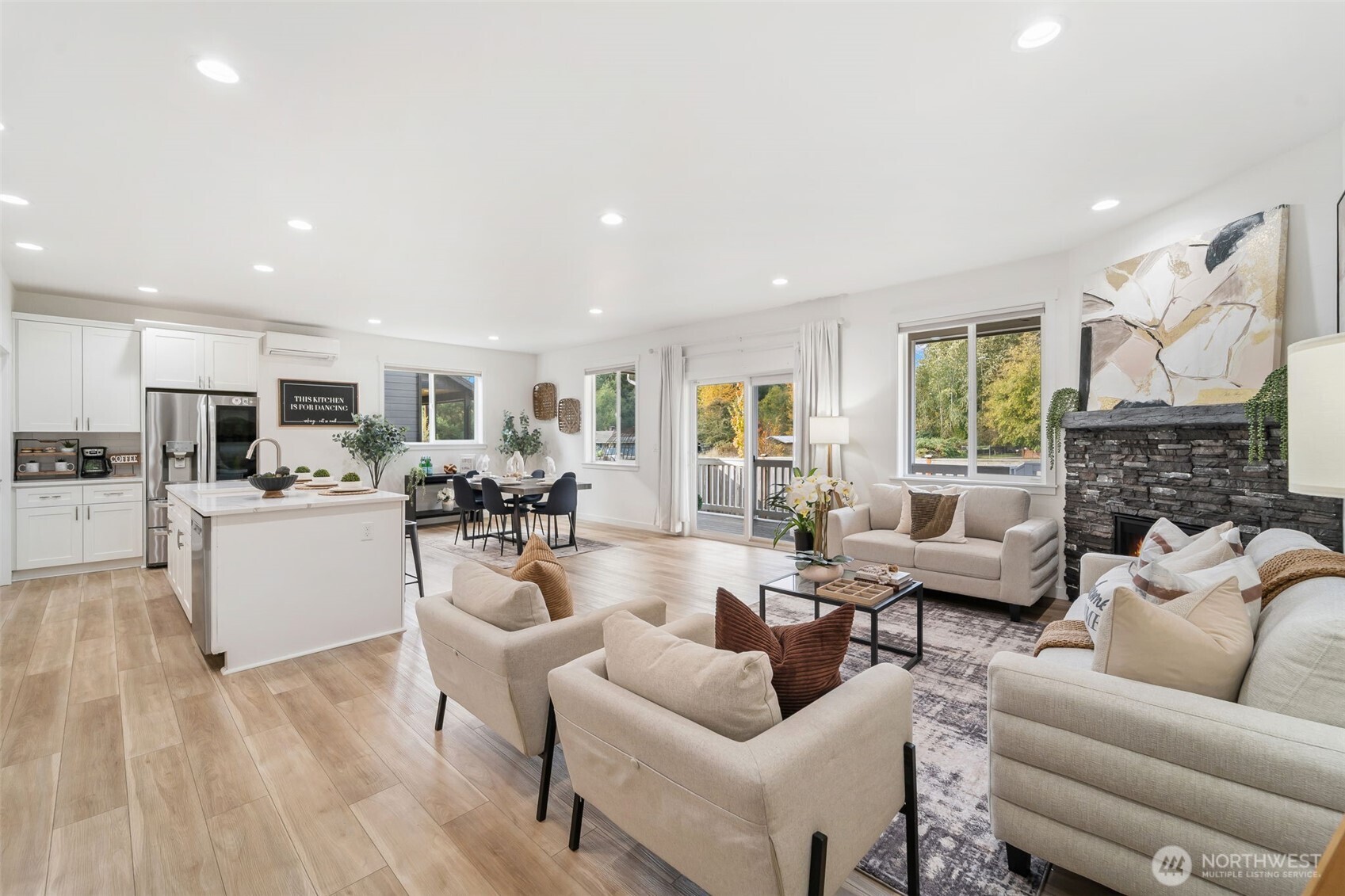 Open floor concept with 10' ceilings, abundant lighting, LVP flooring