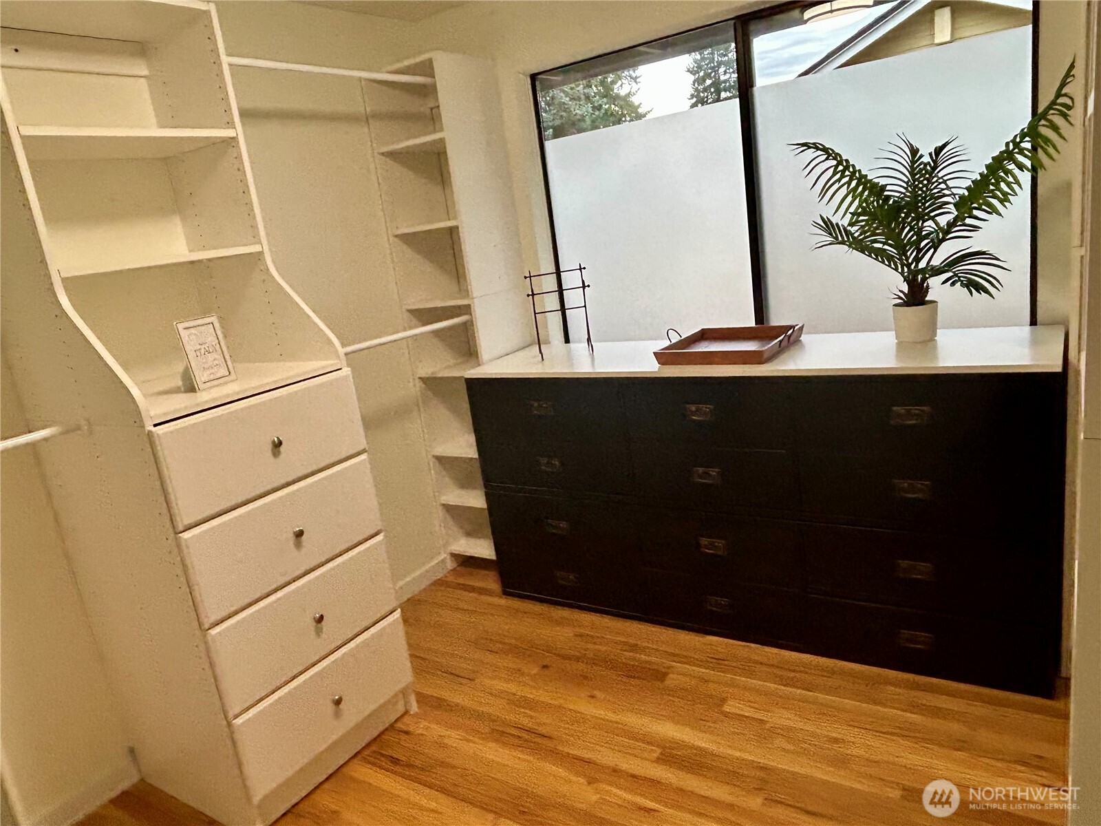 Walk-in closet in Primary Suite.