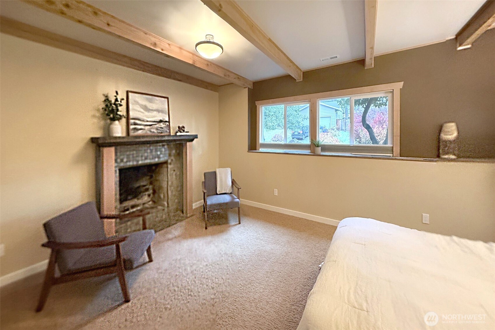 Lower level bedroom with a fireplace!
