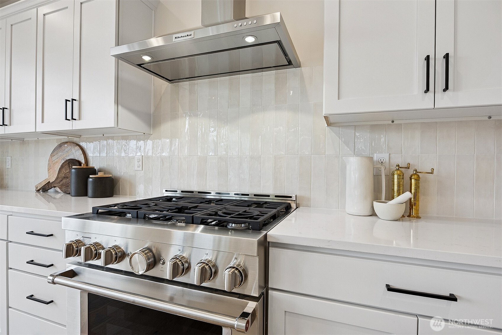 Photo of the exquisite primary bedroom with vaulted ceilings and beautiful territorial and mountain views located on lot 4 at Moorlands Grove.