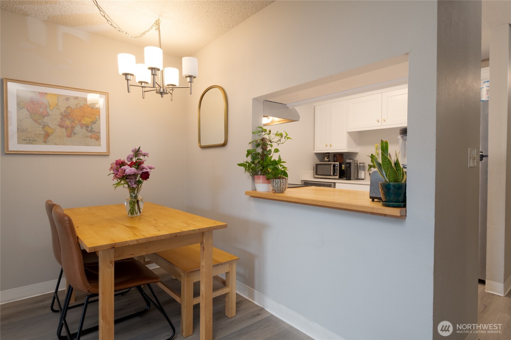 Comfortable dining space with open sightlines to the kitchen—ideal for casual meals or entertaining friends.