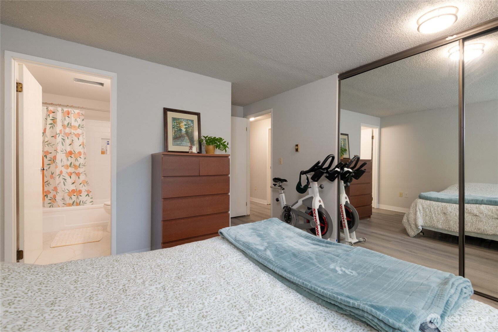 Spacious primary bedroom with en-suite bathroom for convenience and privacy.