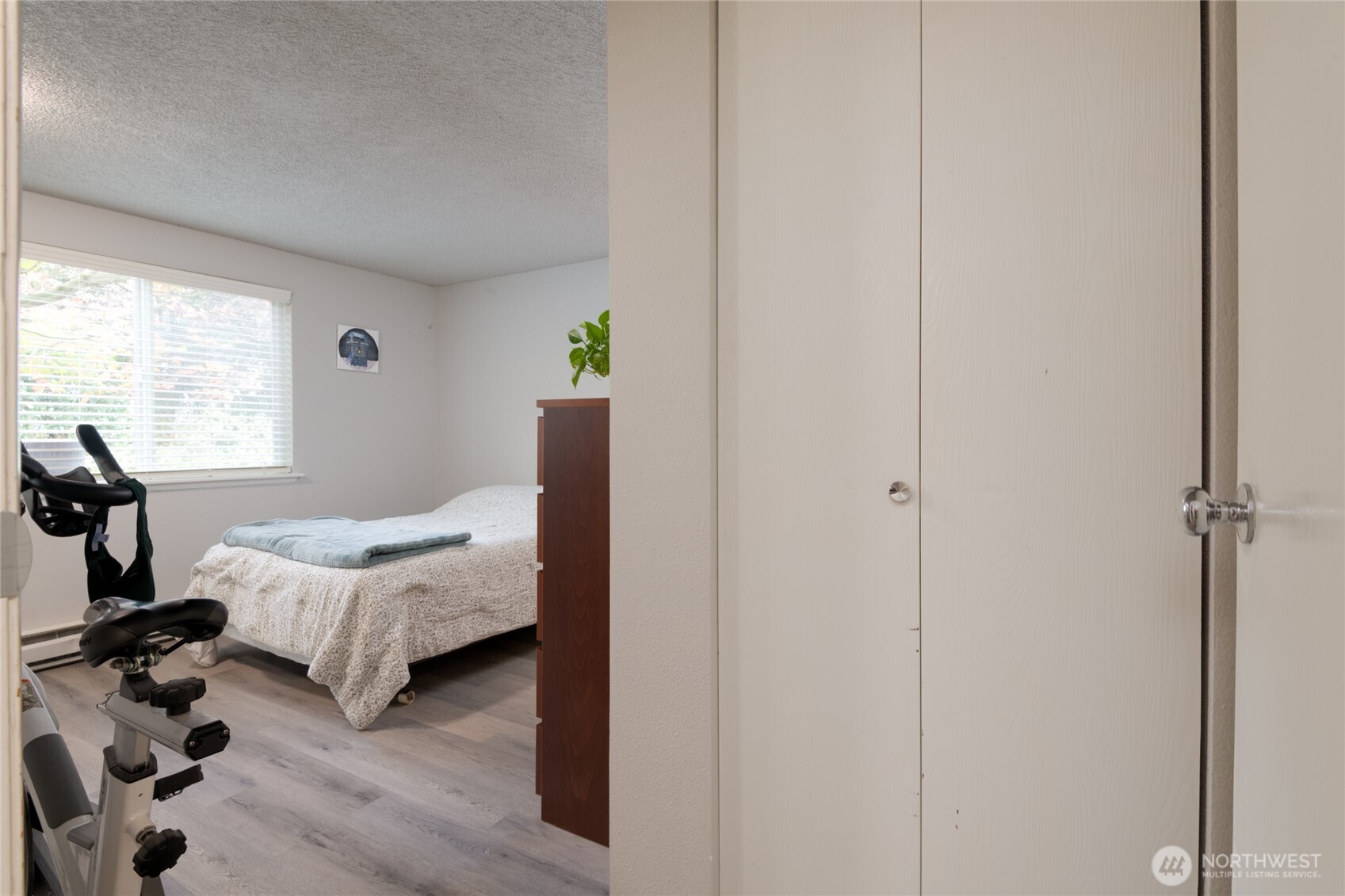 Roomy primary suite with extra storage space for convenience and organization.